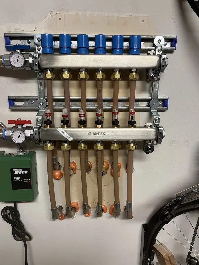 Plumber performing Gas Leak Detection at a residential property in Stafford